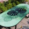 Bàn cafe oval kính mosaic MT0040 trầu bà lá xẻ