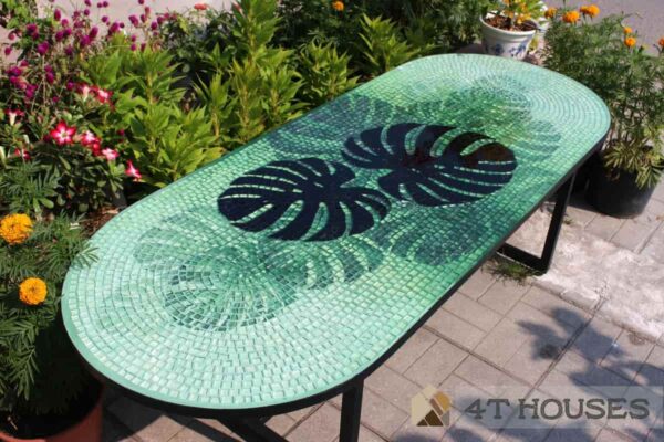 Bàn cafe oval kính mosaic MT0040 trầu bà lá xẻ