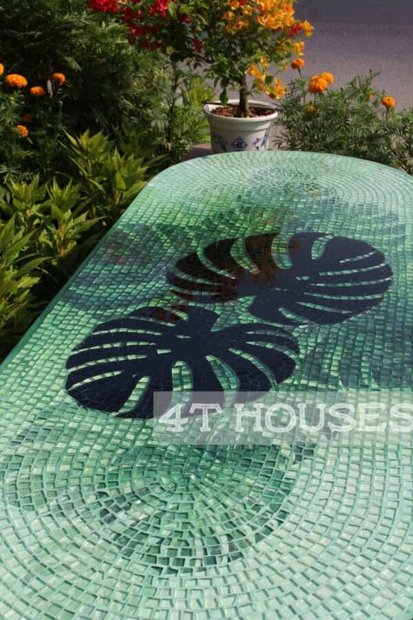 Bàn cafe oval kính mosaic MT0040 trầu bà lá xẻ